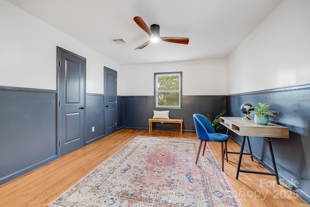 16 Graystone Rd, Asheville, NC 28804 - office space with visible vents, a ceiling fan, a wainscoted wall, and wood finished floors