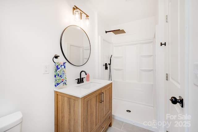 16 Graystone Rd, Asheville, NC 28804 - bathroom featuring a walk in shower, toilet, tile patterned flooring, and vanity
