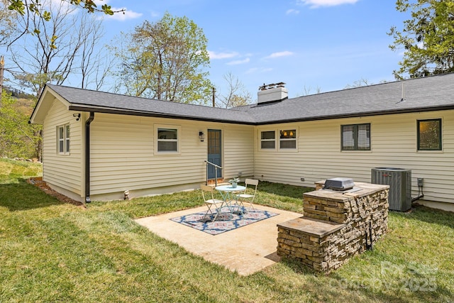 16 Graystone Rd, Asheville, NC 28804 - back of house with a patio, a lawn, central AC, and a chimney