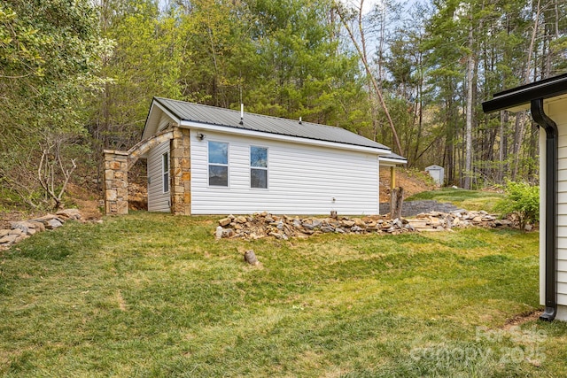16 Graystone Rd, Asheville, NC 28804 - view of home's exterior featuring a yard, metal roof, and stone siding