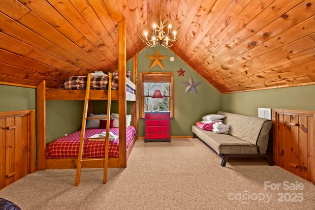 bedroom featuring wooden ceiling, vaulted ceiling, carpet, and a chandelier