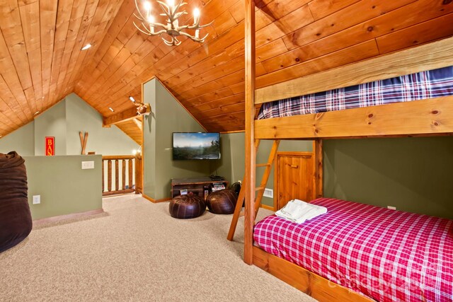 bedroom with carpet, lofted ceiling, wood ceiling, and a notable chandelier