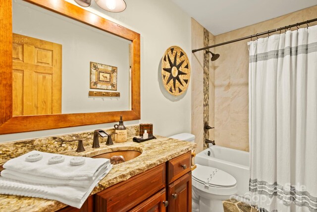 bathroom featuring shower / tub combo with curtain, vanity, and toilet