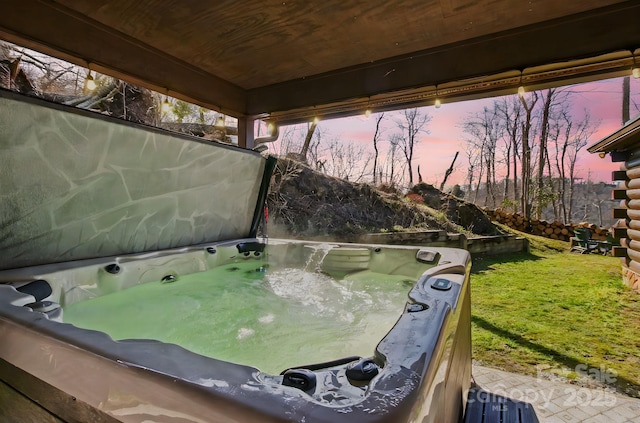 exterior space with a jacuzzi