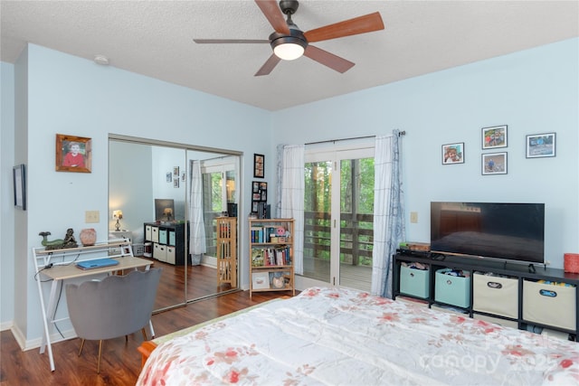 305 Piney Mountain Dr Unit R1, Asheville, NC 28805 - bedroom with access to exterior, wood finished floors, a closet, a ceiling fan, and baseboards