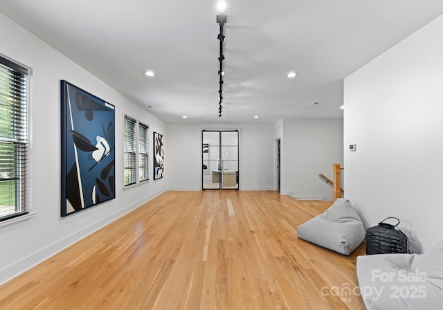 3933 Ayrshire Pl, Charlotte, NC 28210 - unfurnished room with track lighting, recessed lighting, light wood-style floors, and baseboards