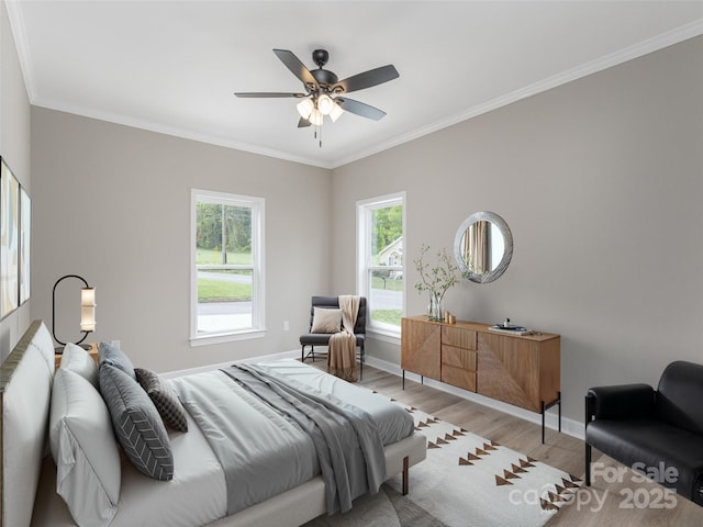 21 Kathy Dr, Waynesville, NC 28786 - bedroom featuring light wood-style floors, baseboards, crown molding, and a ceiling fan