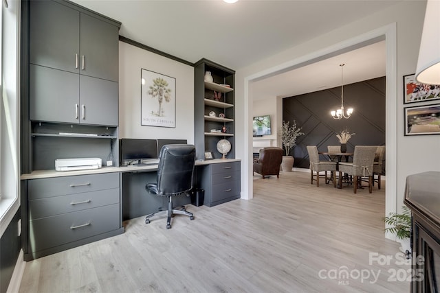 3029 Trace Meadow Ct, York, SC 29745 - office space with built in study area, an inviting chandelier, and light wood-style flooring