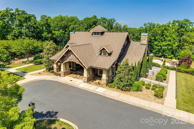 3029 Trace Meadow Ct, York, SC 29745 - craftsman-style home featuring stone siding, a chimney, fence, a shingled roof, and a porch