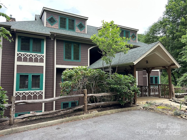 222 Creekside Way, Burnsville, NC 28714 - view of front of home with roof with shingles and a chimney