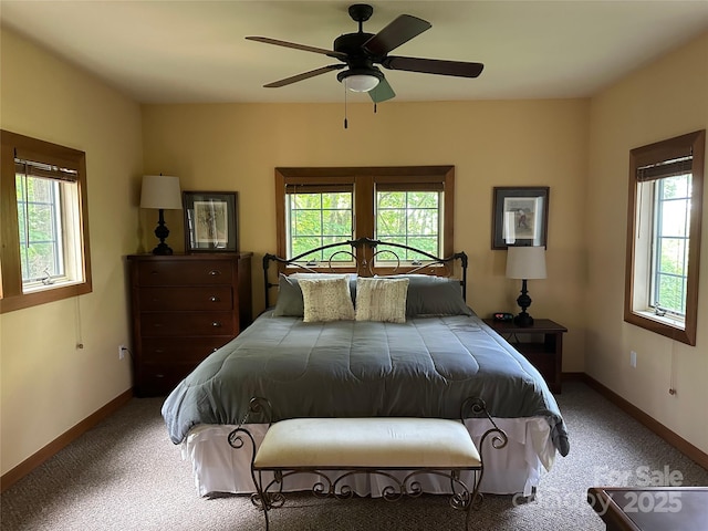 222 Creekside Way, Burnsville, NC 28714 - carpeted bedroom featuring baseboards and ceiling fan