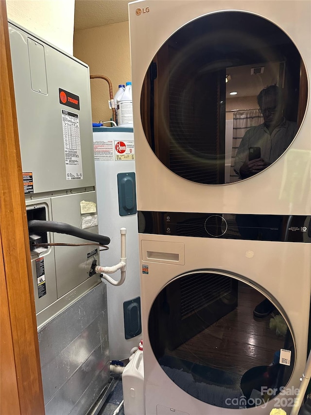 222 Creekside Way, Burnsville, NC 28714 - laundry area with stacked washer and clothes dryer
