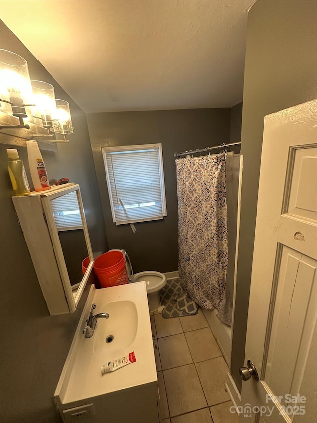 bathroom with a shower with curtain, tile patterned floors, toilet, and vanity