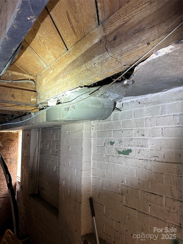 room details featuring concrete block wall