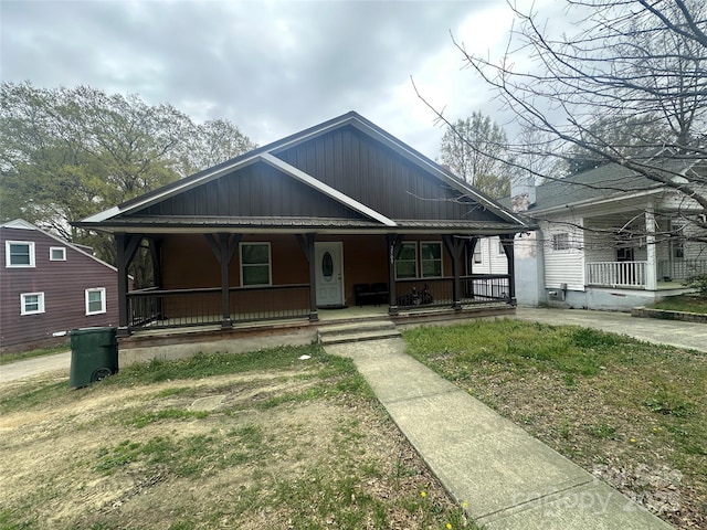 bungalow-style home with a porch