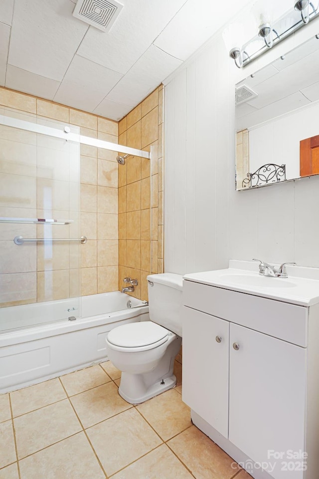 full bath featuring tub / shower combination, visible vents, tile patterned flooring, and toilet