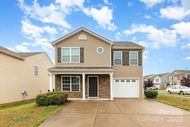 3033 Green Apple Dr, Dallas, NC 28034 - traditional-style house with stone siding, concrete driveway, a front yard, and a garage