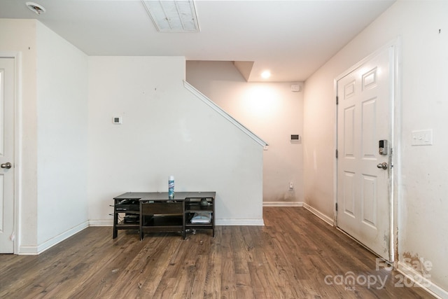 3033 Green Apple Dr, Dallas, NC 28034 - foyer entrance featuring baseboards, visible vents, wood finished floors, and stairs