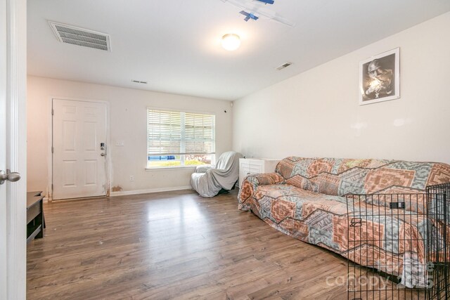 3033 Green Apple Dr, Dallas, NC 28034 - living room featuring baseboards, visible vents, and wood finished floors