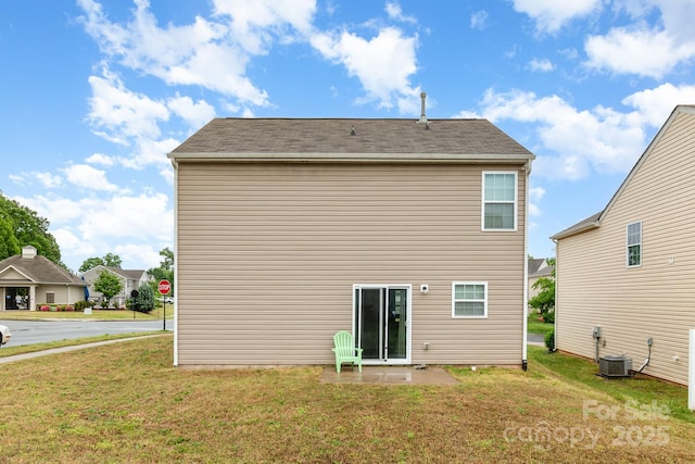 3033 Green Apple Dr, Dallas, NC 28034 - back of house featuring a yard and central air condition unit