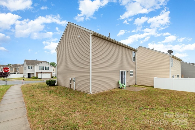 3033 Green Apple Dr, Dallas, NC 28034 - view of property exterior with a residential view, a yard, and fence