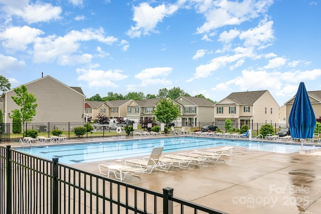 3033 Green Apple Dr, Dallas, NC 28034 - pool with fence, a patio, and a residential view