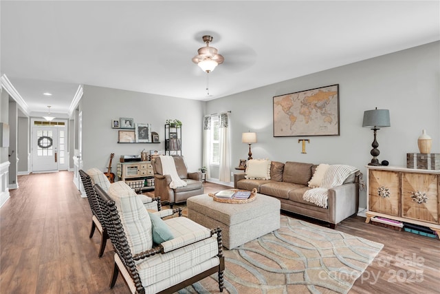 2655 Stonewood Vw, Kannapolis, NC 28081 - living area featuring wood finished floors, a ceiling fan, baseboards, and crown molding