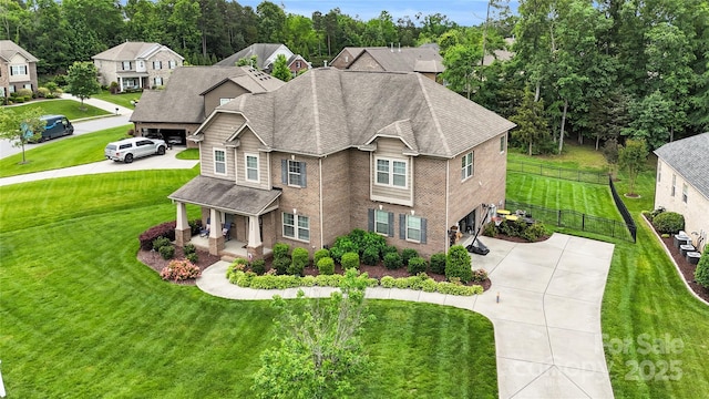 2655 Stonewood Vw, Kannapolis, NC 28081 - view of front of property featuring concrete driveway, a porch, brick siding, and roof with shingles