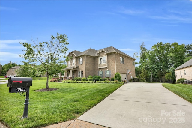 2655 Stonewood Vw, Kannapolis, NC 28081 - view of side of home with brick siding, a lawn, and driveway