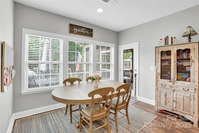 2655 Stonewood Vw, Kannapolis, NC 28081 - dining room with healthy amount of natural light, baseboards, wood finished floors, and recessed lighting