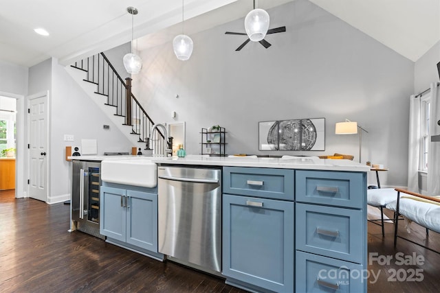 kitchen with stainless steel dishwasher, beverage cooler, light countertops, decorative light fixtures, and dark wood-style floors