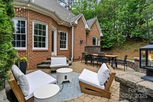 view of patio / terrace with outdoor lounge area and outdoor dining space