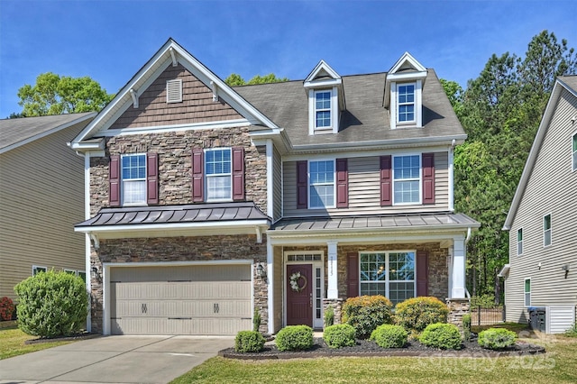 79115 Ridgehaven Rd, Lancaster, SC 29720 - craftsman inspired home featuring concrete driveway, stone siding, a garage, a standing seam roof, and covered porch