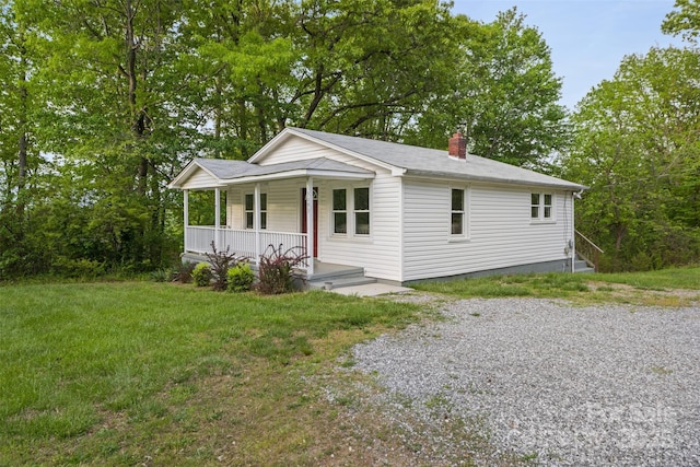 3093 Flat Gap Rd, Valdese, NC 28690 - bungalow-style house with covered porch, a chimney, and a front yard