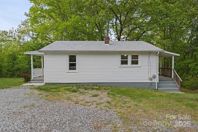 3093 Flat Gap Rd, Valdese, NC 28690 - view of side of property with a chimney