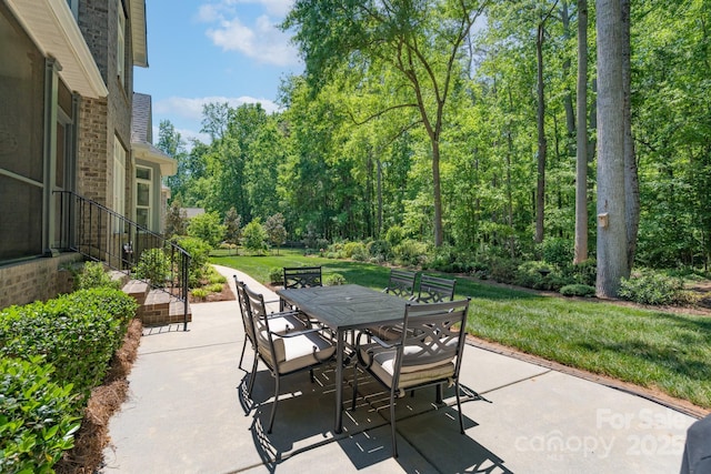 view of patio featuring outdoor dining space