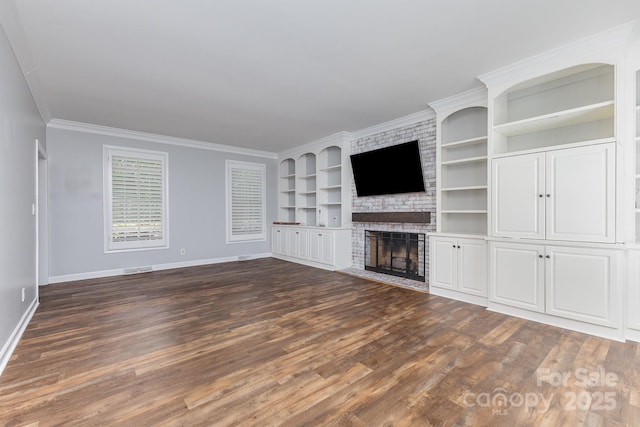 1468 Woodhurst Dr, Rock Hill, SC 29732 - unfurnished living room with built in features, dark wood-style floors, a brick fireplace, and ornamental molding