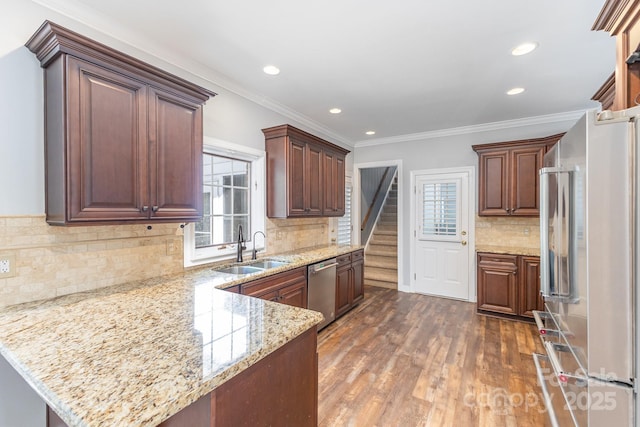1468 Woodhurst Dr, Rock Hill, SC 29732 - kitchen with stainless steel appliances, a peninsula, tasteful backsplash, dark wood-style floors, and recessed lighting