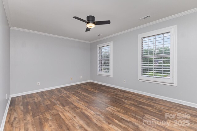1468 Woodhurst Dr, Rock Hill, SC 29732 - empty room with plenty of natural light, crown molding, dark wood-style flooring, and ceiling fan