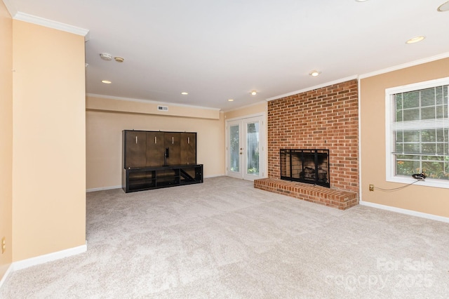 1468 Woodhurst Dr, Rock Hill, SC 29732 - unfurnished living room featuring carpet flooring, crown molding, plenty of natural light, recessed lighting, and a fireplace