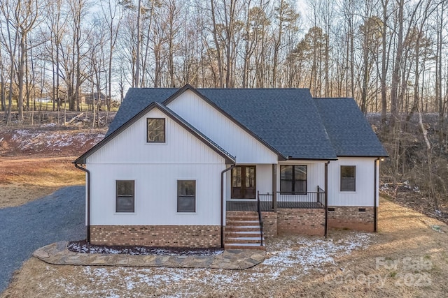 252 Big Lick Rd, Stanfield, NC 28163 - modern farmhouse featuring a porch, crawl space, and roof with shingles