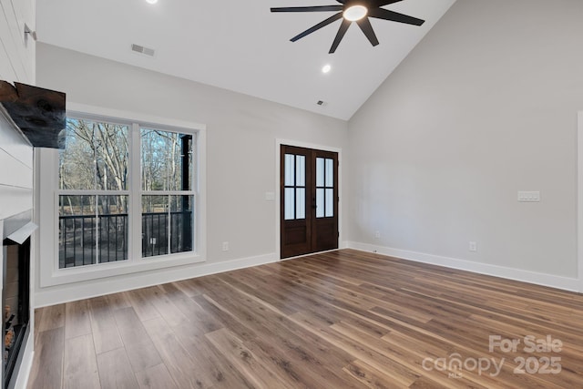 252 Big Lick Rd, Stanfield, NC 28163 - foyer entrance featuring baseboards, visible vents, a ceiling fan, wood finished floors, and high vaulted ceiling