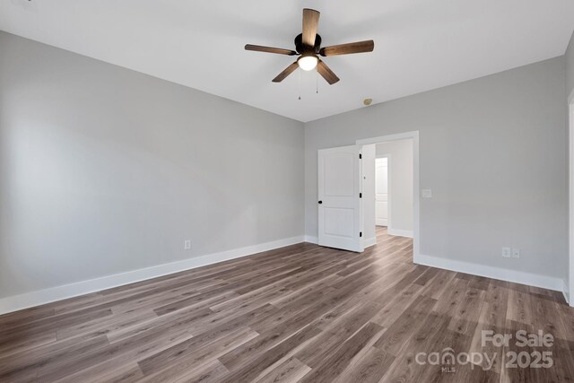 252 Big Lick Rd, Stanfield, NC 28163 - unfurnished room featuring wood finished floors, baseboards, and ceiling fan