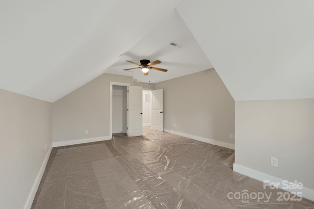 252 Big Lick Rd, Stanfield, NC 28163 - additional living space featuring lofted ceiling, carpet, visible vents, baseboards, and ceiling fan