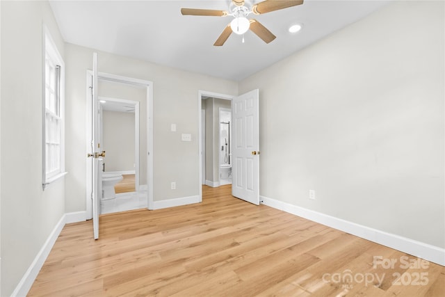 1053 Stoneybrook Ln, Rock Hill, SC 29730 - unfurnished bedroom with light wood-style floors, ceiling fan, and multiple windows