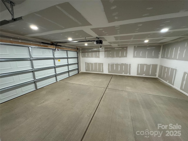 garage featuring a garage door opener