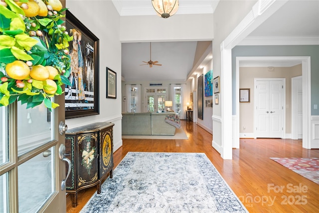 3420 Maryhurst Ln, Charlotte, NC 28226 - entrance foyer featuring wood finished floors, ceiling fan, and crown molding