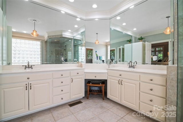 3420 Maryhurst Ln, Charlotte, NC 28226 - full bathroom with crown molding, plenty of natural light, a stall shower, tile patterned flooring, and vanity