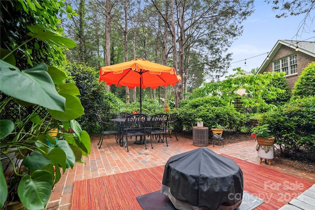 3420 Maryhurst Ln, Charlotte, NC 28226 - view of patio with outdoor dining space, grilling area, and a wooden deck
