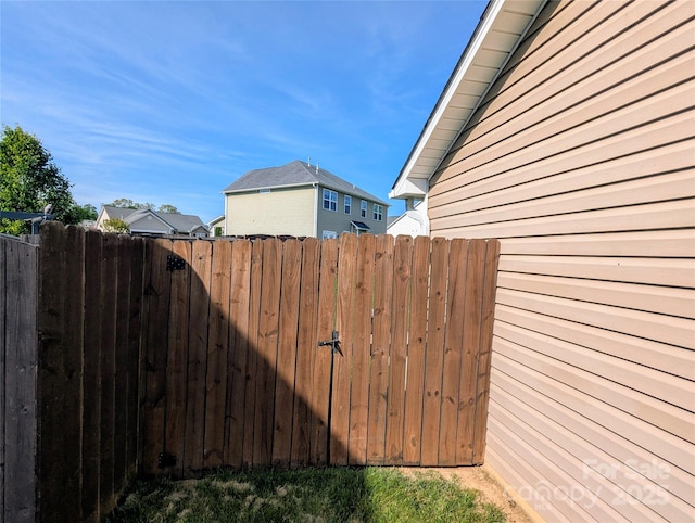 view of property exterior featuring fence